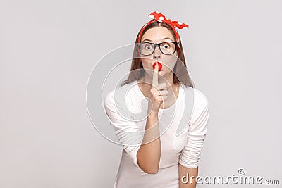 Shh! this is secret. portrait of beautiful emotional young woman Stock Photo