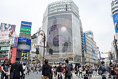 Shibuya, Tokyo, Japan - Shibuya scramble crossing. Many people crossing the road at one of the busiest areas in the world. Editorial Stock Photo