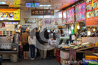 Shilin Night Market food court. A popular and famous destination, endless food stalls, crowds. Largest night market in Taiwan Editorial Stock Photo