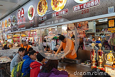 Shilin Night Market food court. A popular and famous destination, endless food stalls, crowds. Largest night market in Taiwan Editorial Stock Photo