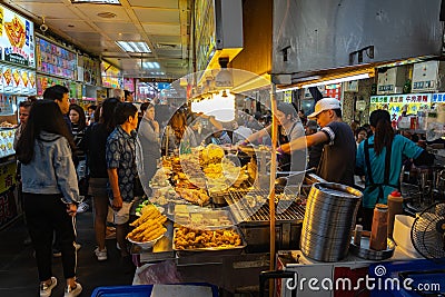Shilin Night Market food court. A popular and famous destination, endless food stalls, crowds. Largest night market in Taiwan Editorial Stock Photo