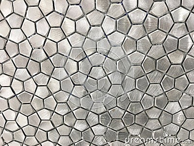 Metallic Stainless Steel Tile in a Geometric Pattern Stock Photo