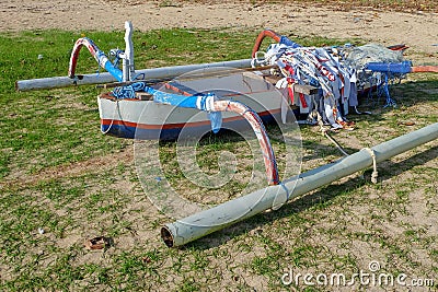 Shing boat being repaired on the shore side Stock Photo