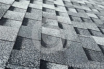 shingles flat polymeric roof-tiles background, close-up view Stock Photo