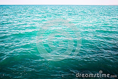 Shining blue water ripple background. Stock Photo