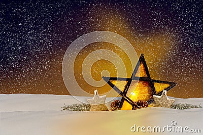 Shining Christmas star at night Stock Photo