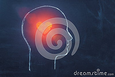 Shining Heart in human head. Love, instinct and romance concept. Chalk drawing. Copy space. Psychology, Valentine day Stock Photo