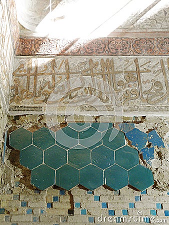 Shining light inside the dome of Soltanieh in Zanjan. Ancient colored tiles on the interior walls of this historic dome. Stock Photo