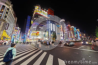 View of cityscape at night with colorful advertisement billboard light beside the street Editorial Stock Photo