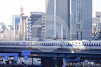 Shinkansen Bullet Train running on rail track at Tokyo, Japan Editorial Stock Photo