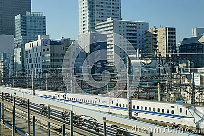 Shinkansen Bullet Train running on track at Tokyo station, Japan Editorial Stock Photo