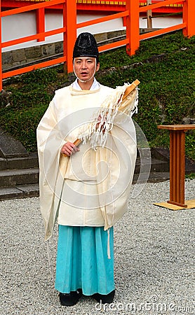 Shinto priest in Kasuga Taisha shrine, Nara, Japan Editorial Stock Photo