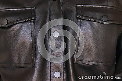 Shiny black faux leather blouse with buttons Stock Photo