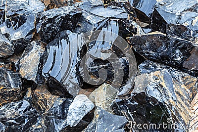 Shiny Black Obsidian Mineraloid Stock Photo
