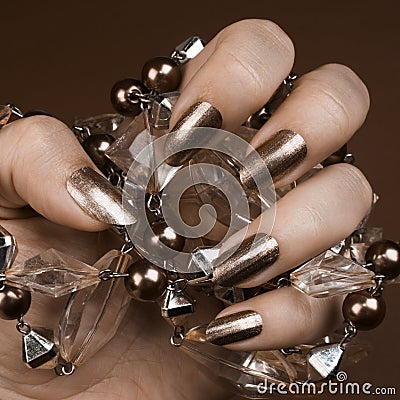 Shiny brown nails Stock Photo