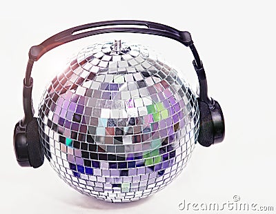 Shiny disco ball with headphones Stock Photo