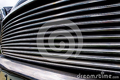 Shiny front grill of car Stock Photo