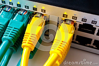 The shiny front part of the switch into which patch cords are inserted Stock Photo