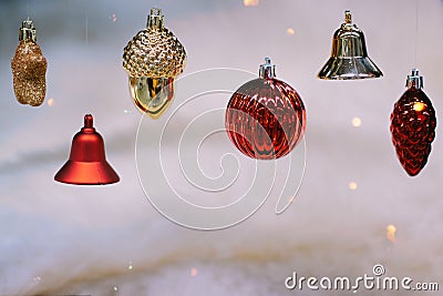 Shiny gold and red christmas balls and bells on retro style for new year Stock Photo