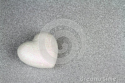 Shiny gray glitter paper and heart. Stock Photo