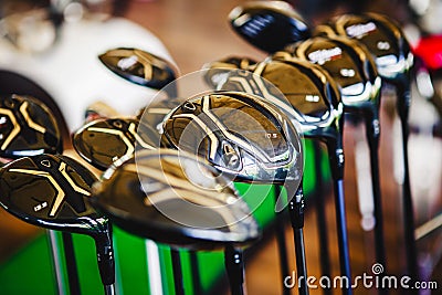 A shiny metal golf clubs for sale Stock Photo