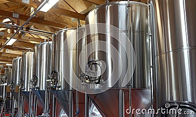 Shiny metal micro brewery tanks Stock Photo