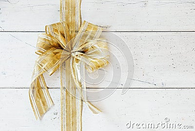 Shiny metallic golden bow Stock Photo