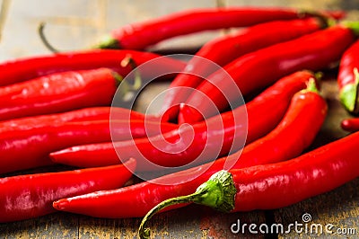 Shiny red pepper stack background Stock Photo