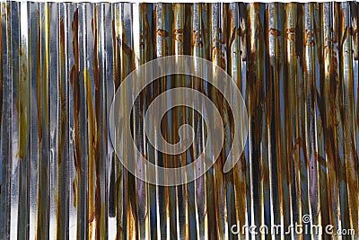 Shiny Rusty colorful retro style corrugated metal sheet for a backdrop Stock Photo