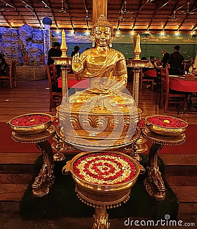 A shiny sculpture of Lord Buddha installed in Mysore, Karnataka Editorial Stock Photo