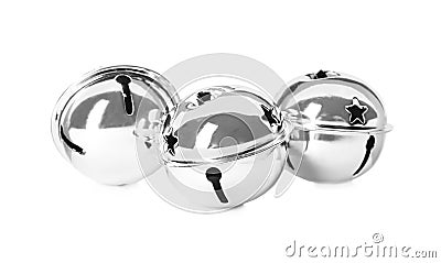 Shiny silver sleigh bells on white background Stock Photo