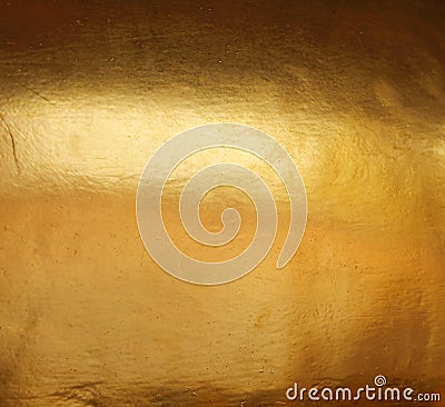 Shiny yellow leaf gold foil texture background Stock Photo