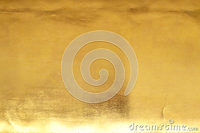 Shiny yellow leaf gold foil texture background Stock Photo