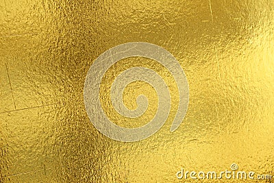 Shiny yellow leaf gold foil texture background Stock Photo