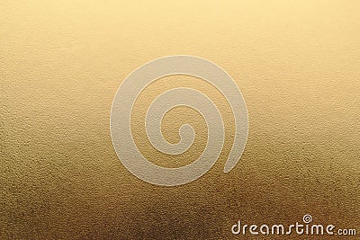 Shiny yellow metallic gold leaf foil texture background Stock Photo