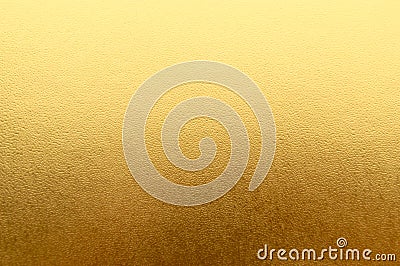 Shiny yellow metallic gold leaf foil texture background Stock Photo