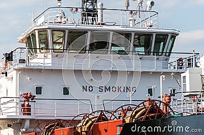 Ship bridge for navigation and control. Cargo ship waiting for a captain and crew. Vessel is ready to shove off and start new Stock Photo