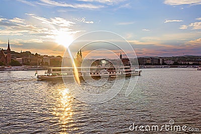 Ship on the Danube River in Budapest Hungary in the rays of the sun Stock Photo