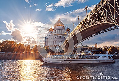 Ship of Flotilla Radisson Royal. Moscow River Cruise. The Cathedral of Christ the Savior at sunset. Editorial Stock Photo