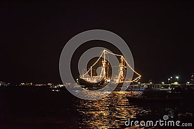 Ship glowing in the sea Stock Photo