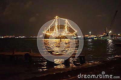 Ship glowing in the sea Stock Photo