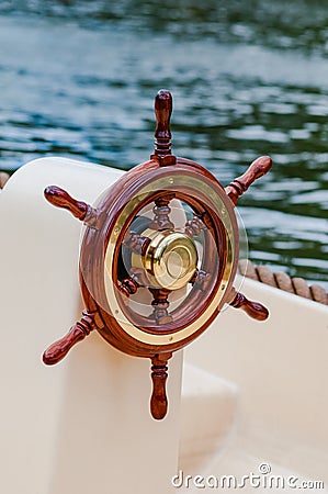 Ship helm steering wheel boat yacht nautical equipment attractive Stock Photo