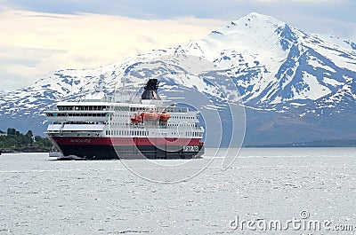The ship hurtigruten entering tromsoe harbour Editorial Stock Photo