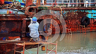 Ship repair worker in Taoyuan, Taiwan Editorial Stock Photo