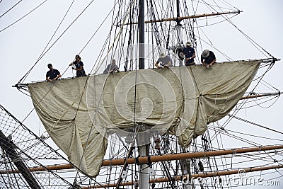 Lowing the sail Editorial Stock Photo