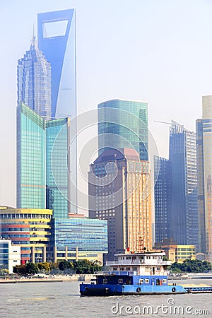 Ship at sunset on the Huangpu River in Shanghai Stock Photo