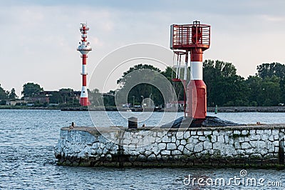 Ship traffic control tower. Weather and sea monitoring tower. Jetty breakwater for protect ships from sea waves Stock Photo