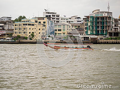 The ship transporting passengers across the river at the river Chao Phraya in Bangkok Editorial Stock Photo