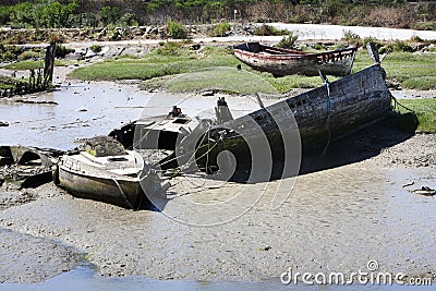 Ship wrecks falling dry at low tide in Noirmoutier Stock Photo