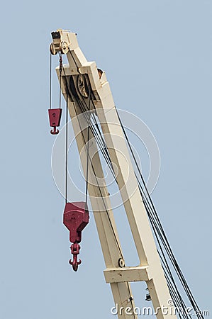 Shipboard crane with two hooks Stock Photo